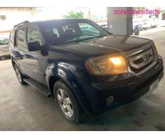 Extremely Clean Registered Honda pilot 2010 model with AC (Call 08032556568)